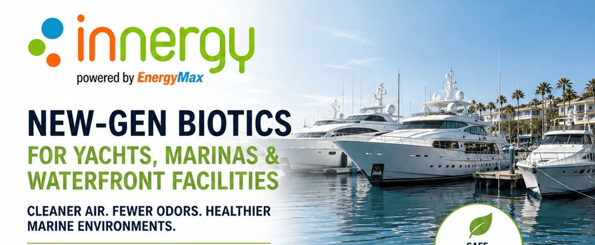 Yachts at marina next to Innergy banner